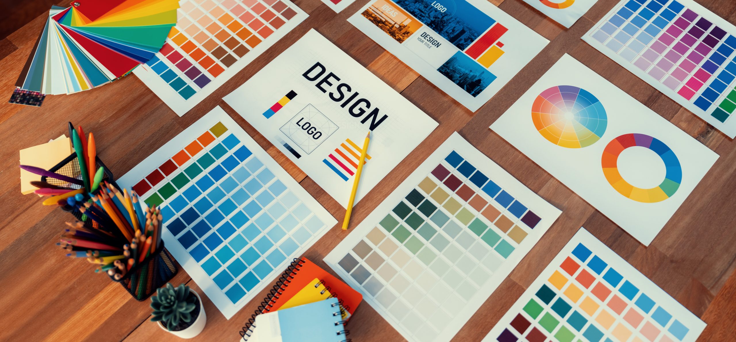 Panorama,Shot,Of,Various,Color,Palette,Idea,Papers,Arranged,Neatly